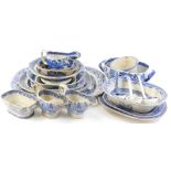 A large quantity of 19thC blue and white printed pottery, mainly Willow pattern