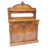 A Victorian walnut chiffonier, the raised back with a shaped shell above a rectangular mirror plate,