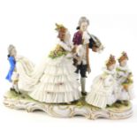 An unusual German porcelain crinoline wedding group, depicting a lady being waltzed down the aisle