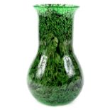 An unusual Scottish glass vase, with black and green mottled decoration, possibly Monart, 21cm H.