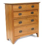 A Victorian pale walnut chest of drawers, with two short, three long drawers, each with