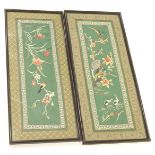 A pair of Chinese embroidered silk panels, each depicting birds on flowering branches, 63cm x 25cm.