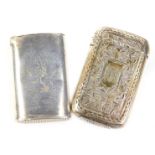 A Victorian silver Vesta case, with engraved monogram, Birmingham 1882 and another. (2)