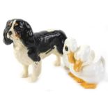 A Beswick ceramic model of a King Charles spaniel, and a Royal Osborne duck group (2)