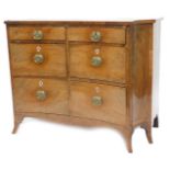 A 19thC mahogany commode or chest of drawers, with boxwood strung top, above an arrangement of six