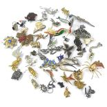 Costume jewellery brooches, to include a seahorse brooch, swan brooch, cat in a basket, silver