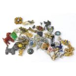 Costume jewellery brooches, to include a silver plated pheasant brooch, silver gilt butterfly