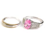 Two dress rings, to include a silver diamond set and gold design dress ring, marked to band .15