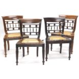 A set of four Colonial hardwood dining chairs, in early 19thC style, each with a carved and