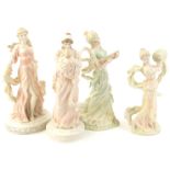 Four Wedgwood ceramic figures, to include The Classic Collection Devotion, Enchantment etc.