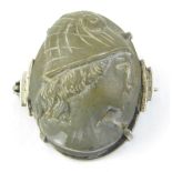 A cameo brooch, in silver frame, the cameo of a warrior looking right, raised and carved.