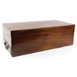 A 19thC mahogany writing box, the hinged lid enclosing a velvet lined interior with brass side