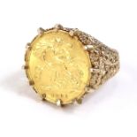 A Victorian half gold sovereign ring, dated 1901, in claw setting, on a yellow metal band, marked