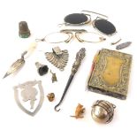 Miscellaneous items, to include a silver thimble, a small silver clip, a bookmark, miniature pen