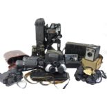 A collection of Tasco and various other pairs of binoculars, a Pathe home cinema projector etc.