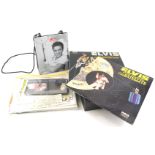 A collection of Elvis memorabilia, to include facsimile tickets, some albums, bag etc.