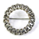 A circular bar brooch, set with links and tiny white stones, on a gold coloured back, unmarked, 9.2g