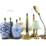 A collection of ceramic lamp bases, to include an adjustable brass desk lamp, with shell shaped