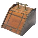 An Edwardian walnut coal scuttle, with a brass handle, 32cm W.