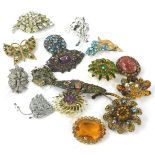 Costume jewellery brooches, to include mainly paste stone set elaborately pierced brooches, in the