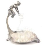 A WMF silver plated liqueur set in Art Nouveau style, modelled in the form of a lady, seated on a