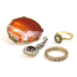 A quantity of rings and brooches, to include 9ct gold eternity ring, a gold plated dress ring, an