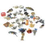 Various costume jewellery brooches, to include animal brooches, autumn leaf brooch, silver elephant,