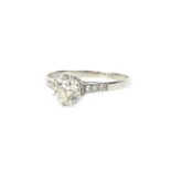 A platinum diamond dress ring, with round brilliant cut central diamond approximately 0.95cts,