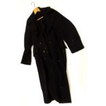 An Arp overcoat, complete with brass buttons.