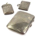 A plain silver cigarette case and two engraved silver Vesta cases, Birmingham 1921 etc., 3oz