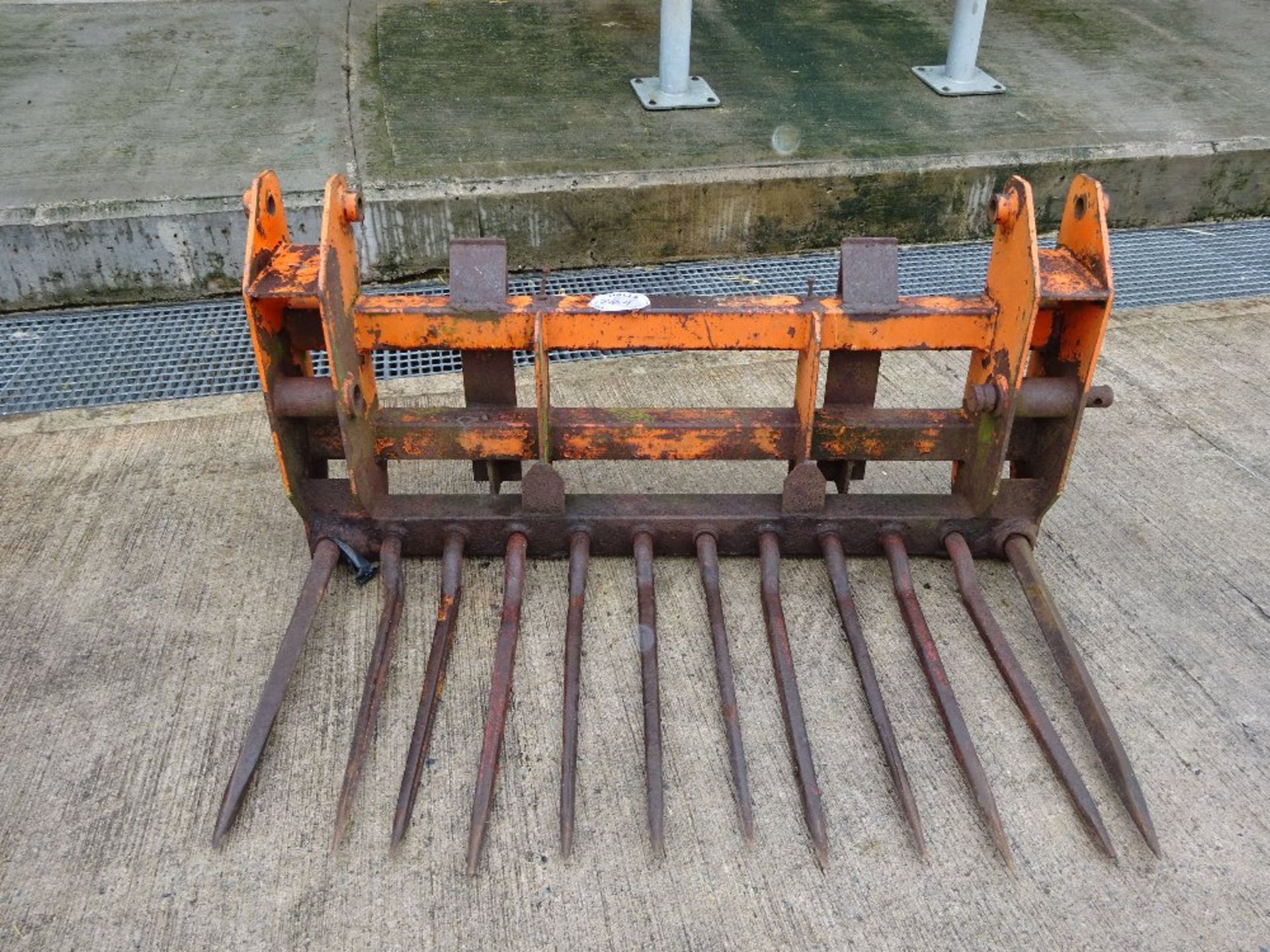 ORANGE MUCK FORK , TRINA LOADER BRACKETS