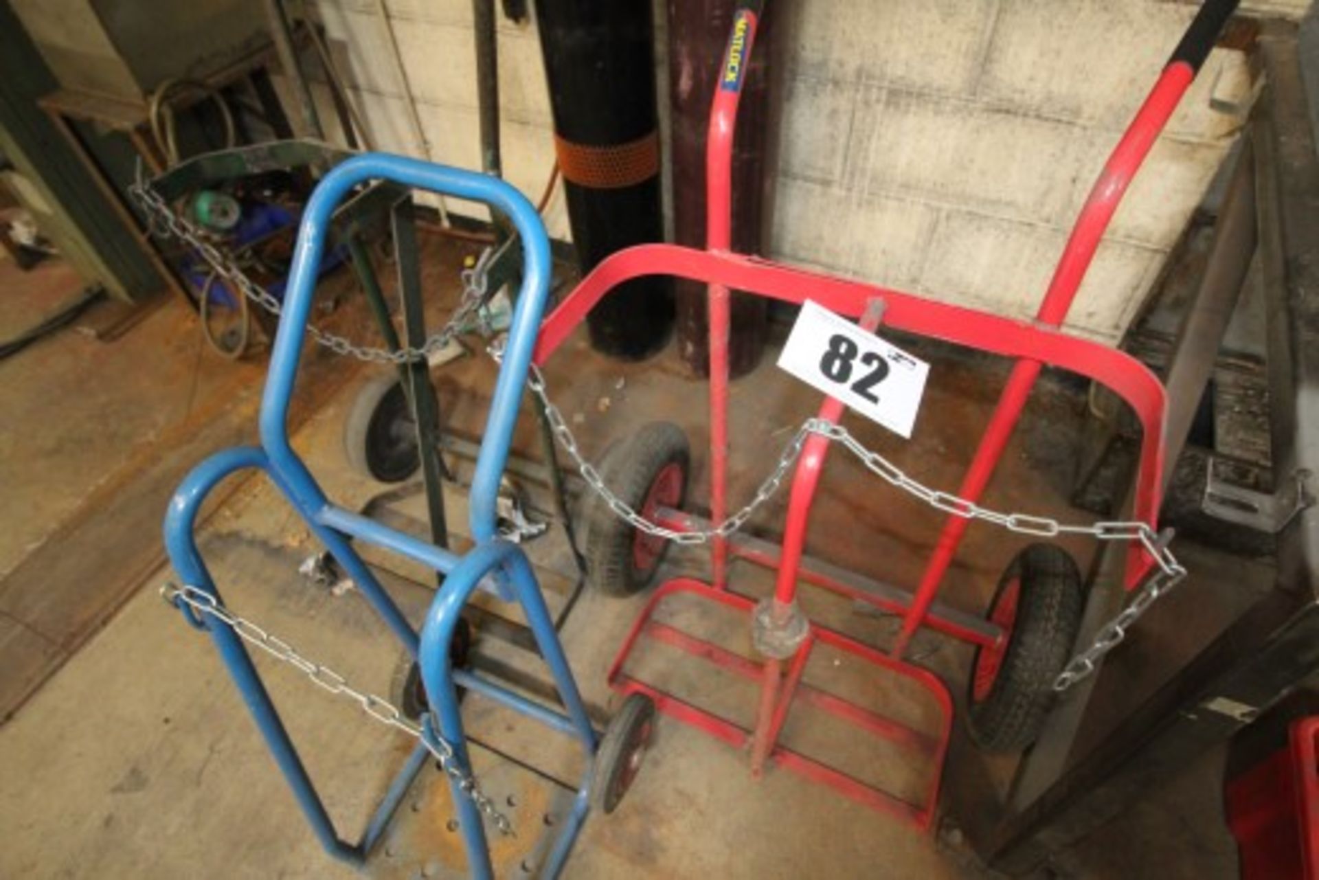 1 RED DOUBLE BOTTLE TROLLEY, 1 GREEN DOUBLE BOTTLE TROLLEY & 1 BLUE SINGLE BOTTLE TROLLEY