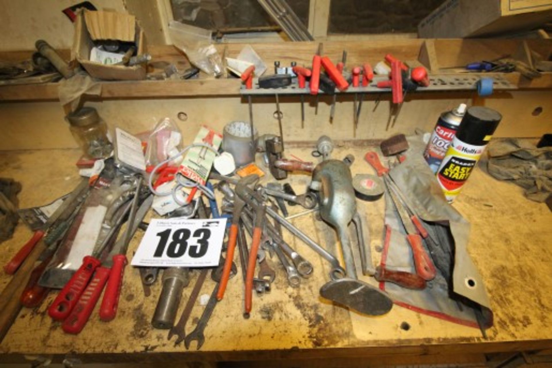 CONTENTS ON BENCH OF VARIOUS HAND TOOLS