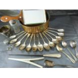 Small copper pan with ring handles on lions head, along with various silverplate teaspoons,