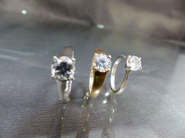 Three CZ solitaire rings - (1) approx 1ct (Diamond Size) CZ gold on silver UK - P, USA - 7.5. (2) - Image 5 of 5