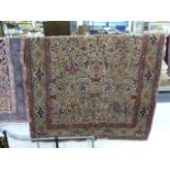 Large Persian style red ground rug