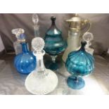 Collection of some cut glass decanters and blue glass vases