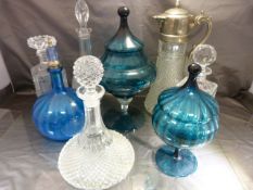 Collection of some cut glass decanters and blue glass vases