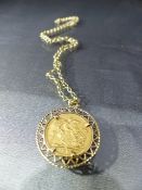 9ct Gold Belcher chain with half sovereign in 9ct Gold mount Total Weight approx - 10.4g