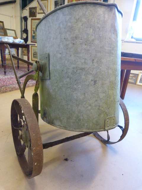 Large oval shaped galvanised water tank on antique cast iron frame with wheels - Image 2 of 7