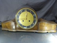 German Kienzle mantle clock of with Gilt Coloured face with a black band and gilt numbers in. The