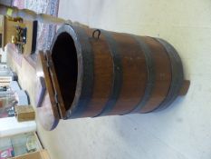 Brass bound Indian hardwood Peat bucket with hinged lid and on legs