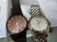 New in box Skagen watch along with a Givenchy reproduction watch.