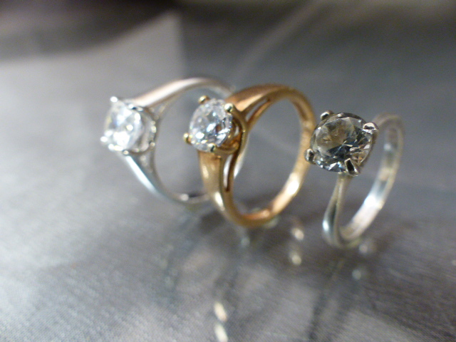 Three CZ solitaire rings - (1) approx 1ct (Diamond Size) CZ gold on silver UK - P, USA - 7.5. (2) - Image 4 of 5