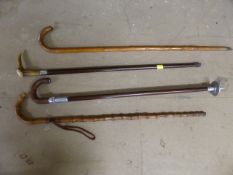 Four walking canes - 1 with hallmarked silver collar and horn handle