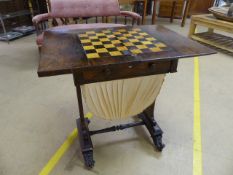 An early Victorian Rosewood Games table, c.1850's, Swivel top with fold out leaf revealing Chess