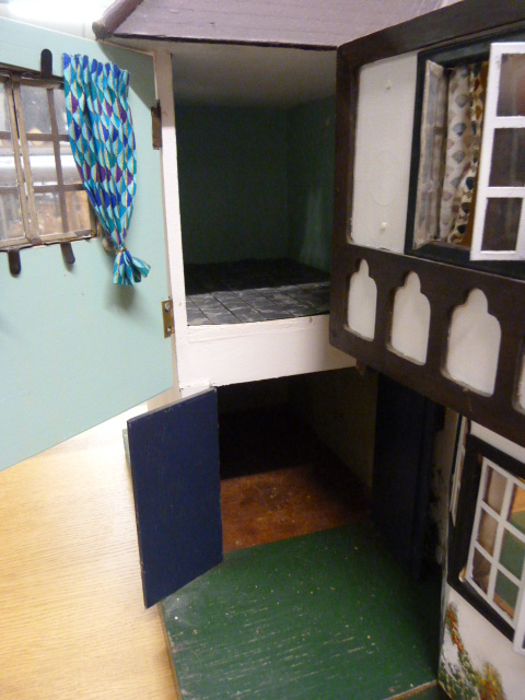 A Triang 'Stockbrokers' Tudor style dolls house, 1930s, grey painted triple apex roof, three - Image 6 of 7