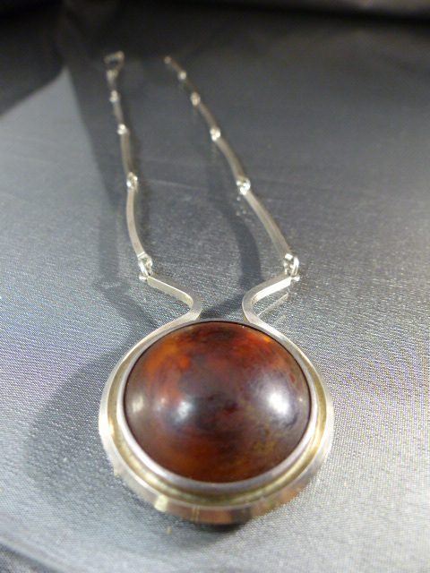 Contemporary Denmark, Sterling silver 925 and Amber Necklace by N.E.From. The approx 27mm diameter