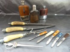 Horn handled carving set with white metal mounts along with three leather bound hip flasks.