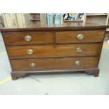 Low chest of four drawers in mahogany, Poss George III with loop drop handles.